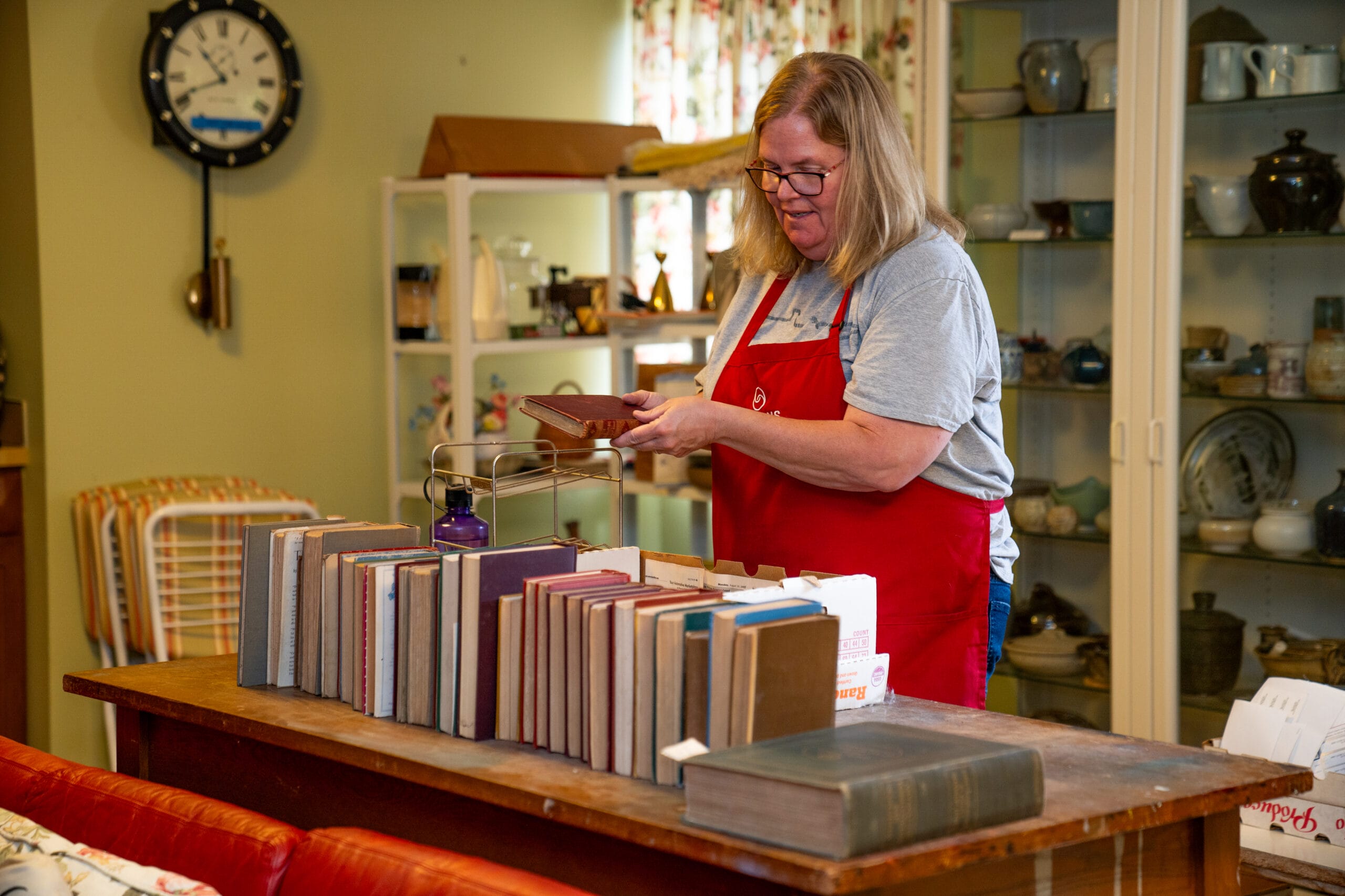 staff member staging a sale at Grasons of Southwest Denver