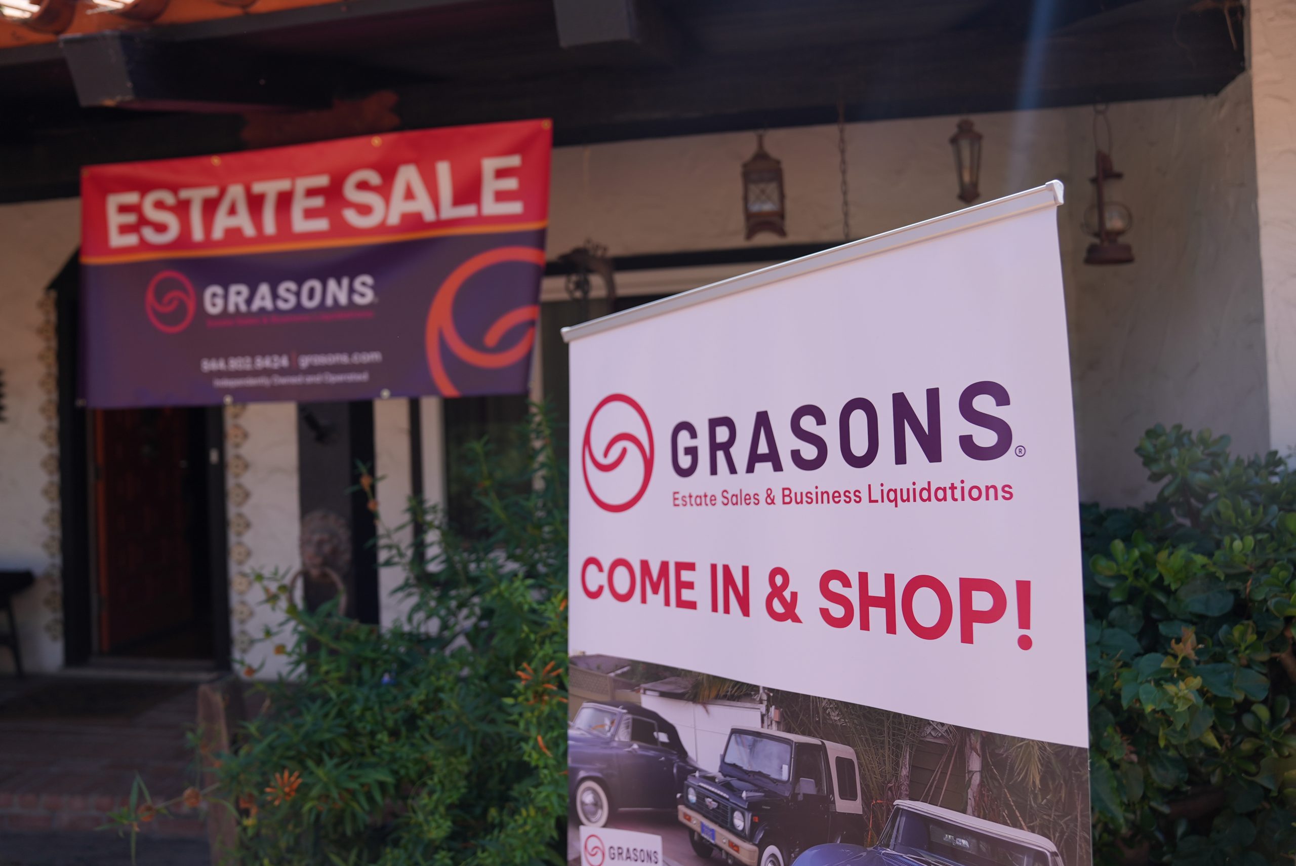 Signs indicate a managed business liquidation inside a building.